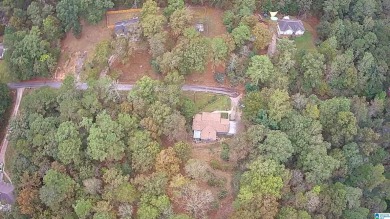 Welcome to Million Dollar Lakes. This 3-bedroom, 1.5-bath home on Lakeview Country Club in Alabama - for sale on GolfHomes.com, golf home, golf lot