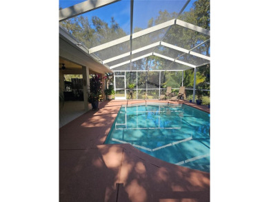 Check out this amazing POOL HOME located in the Oakwood Golf on Oakwood Golf Club in Florida - for sale on GolfHomes.com, golf home, golf lot