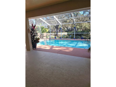 Check out this amazing POOL HOME located in the Oakwood Golf on Oakwood Golf Club in Florida - for sale on GolfHomes.com, golf home, golf lot