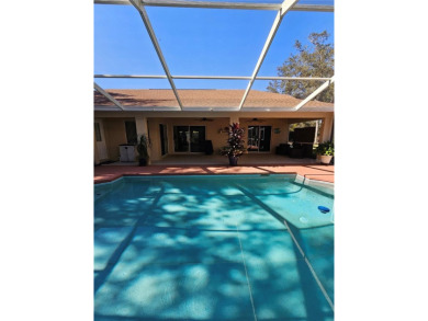 Check out this amazing POOL HOME located in the Oakwood Golf on Oakwood Golf Club in Florida - for sale on GolfHomes.com, golf home, golf lot