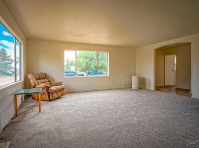 Charming three-bedroom, two-bath home in the heart of Colorado on Hollydot Golf Course in Colorado - for sale on GolfHomes.com, golf home, golf lot