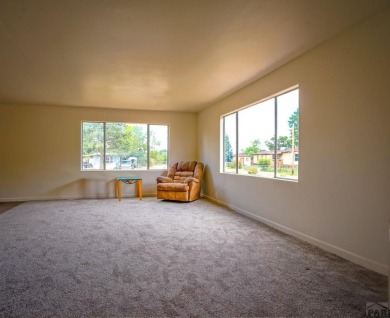 Charming three-bedroom, two-bath home in the heart of Colorado on Hollydot Golf Course in Colorado - for sale on GolfHomes.com, golf home, golf lot