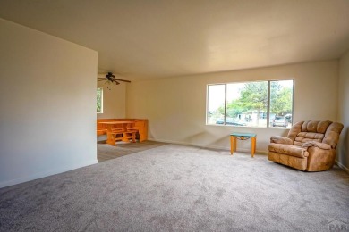 Charming three-bedroom, two-bath home in the heart of Colorado on Hollydot Golf Course in Colorado - for sale on GolfHomes.com, golf home, golf lot