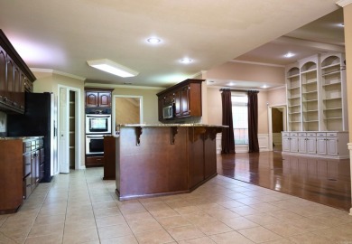 Experience the epitome of luxury in this stunning 4-bedroom, 2 on Paragould Country Club in Arkansas - for sale on GolfHomes.com, golf home, golf lot