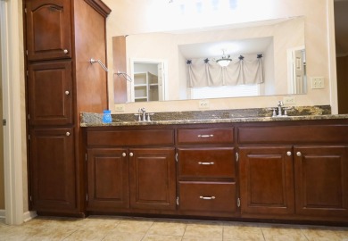 Experience the epitome of luxury in this stunning 4-bedroom, 2 on Paragould Country Club in Arkansas - for sale on GolfHomes.com, golf home, golf lot