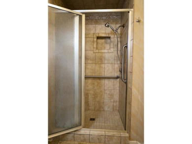 Experience the epitome of luxury in this stunning 4-bedroom, 2 on Paragould Country Club in Arkansas - for sale on GolfHomes.com, golf home, golf lot