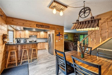 Welcome to a one-of-a-kind haven that effortlessly blends rustic on Birnamwood Golf Course in Minnesota - for sale on GolfHomes.com, golf home, golf lot