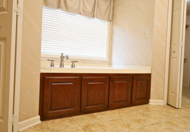 Experience the epitome of luxury in this stunning 4-bedroom, 2 on Paragould Country Club in Arkansas - for sale on GolfHomes.com, golf home, golf lot