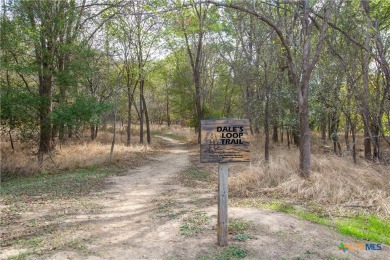 Tahitian Village, located in Bastrop, TX, is a peaceful on Pine Forest Golf Club in Texas - for sale on GolfHomes.com, golf home, golf lot