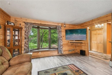 Welcome to a one-of-a-kind haven that effortlessly blends rustic on Birnamwood Golf Course in Minnesota - for sale on GolfHomes.com, golf home, golf lot