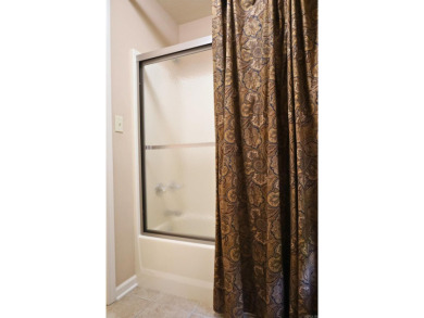 Experience the epitome of luxury in this stunning 4-bedroom, 2 on Paragould Country Club in Arkansas - for sale on GolfHomes.com, golf home, golf lot