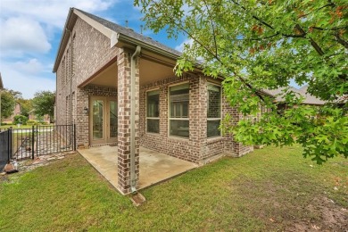 Welcome to a beautiful home in the desirable Heath Golf  Yacht on Heath Golf and Yacht Club in Texas - for sale on GolfHomes.com, golf home, golf lot