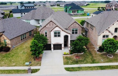 Welcome to a beautiful home in the desirable Heath Golf  Yacht on Heath Golf and Yacht Club in Texas - for sale on GolfHomes.com, golf home, golf lot