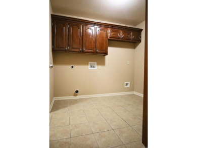 Experience the epitome of luxury in this stunning 4-bedroom, 2 on Paragould Country Club in Arkansas - for sale on GolfHomes.com, golf home, golf lot