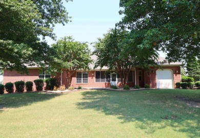 Experience the epitome of luxury in this stunning 4-bedroom, 2 on Paragould Country Club in Arkansas - for sale on GolfHomes.com, golf home, golf lot
