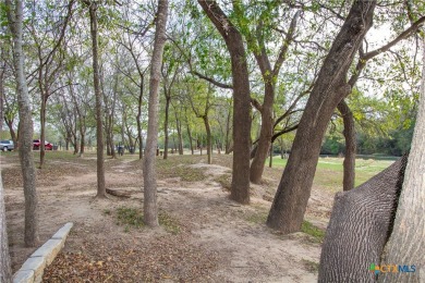 Tahitian Village, located in Bastrop, TX, is a peaceful on Pine Forest Golf Club in Texas - for sale on GolfHomes.com, golf home, golf lot