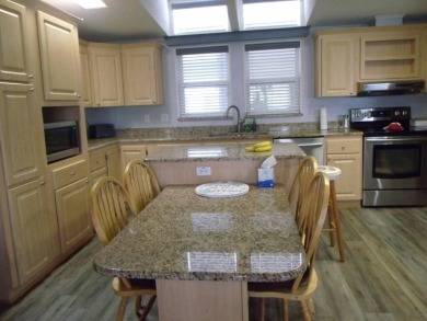 Stunning 3 Bedroom Palm Harbor Home -  Key Features:  Bedrooms: on Schalamar Creek Golf and Country Club in Florida - for sale on GolfHomes.com, golf home, golf lot