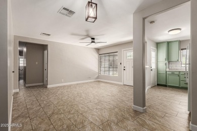 Seize the chance to own this Updated 2-bedroom townhome in on Encanto 18 Golf Course in Arizona - for sale on GolfHomes.com, golf home, golf lot