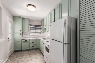 Seize the chance to own this Updated 2-bedroom townhome in on Encanto 18 Golf Course in Arizona - for sale on GolfHomes.com, golf home, golf lot