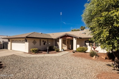 It is a quick golf cart trip down the street to the beautiful on London Bridge Golf Course in Arizona - for sale on GolfHomes.com, golf home, golf lot