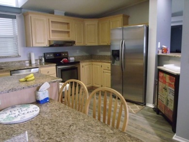 Stunning 3 Bedroom Palm Harbor Home -  Key Features:  Bedrooms: on Schalamar Creek Golf and Country Club in Florida - for sale on GolfHomes.com, golf home, golf lot