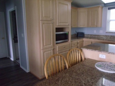Stunning 3 Bedroom Palm Harbor Home -  Key Features:  Bedrooms: on Schalamar Creek Golf and Country Club in Florida - for sale on GolfHomes.com, golf home, golf lot
