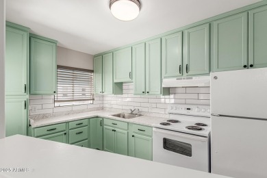 Seize the chance to own this Updated 2-bedroom townhome in on Encanto 18 Golf Course in Arizona - for sale on GolfHomes.com, golf home, golf lot
