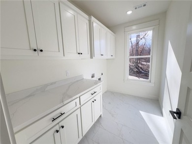 Nestled in the Ozarks, this beautiful home offers a peaceful on Branchwood Golf Course in Arkansas - for sale on GolfHomes.com, golf home, golf lot