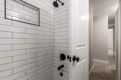 Seize the chance to own this Updated 2-bedroom townhome in on Encanto 18 Golf Course in Arizona - for sale on GolfHomes.com, golf home, golf lot