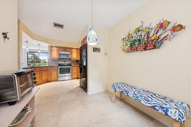 Beautifully furnished townhome located in the Windermere on PGA National Golf Club in Florida - for sale on GolfHomes.com, golf home, golf lot