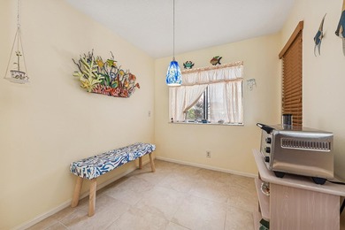 Beautifully furnished townhome located in the Windermere on PGA National Golf Club in Florida - for sale on GolfHomes.com, golf home, golf lot