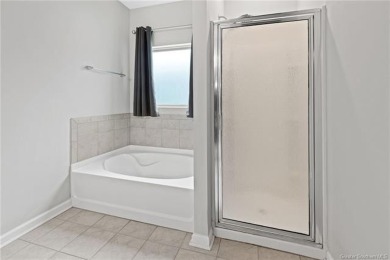 Modern 4-bedroom, 2-bathroom house positioned along the greens on The National Golf Club of Louisiana in Louisiana - for sale on GolfHomes.com, golf home, golf lot