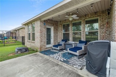 Modern 4-bedroom, 2-bathroom house positioned along the greens on The National Golf Club of Louisiana in Louisiana - for sale on GolfHomes.com, golf home, golf lot