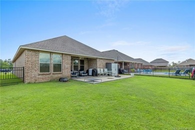 Modern 4-bedroom, 2-bathroom house positioned along the greens on The National Golf Club of Louisiana in Louisiana - for sale on GolfHomes.com, golf home, golf lot