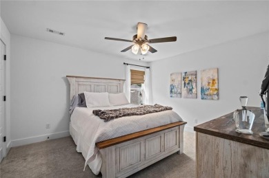 Welcome to this elegant and spacious 4 bedroom, 3.5 bath garden on Shadow Valley Country Club in Arkansas - for sale on GolfHomes.com, golf home, golf lot