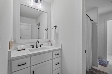 Welcome to this elegant and spacious 4 bedroom, 3.5 bath garden on Shadow Valley Country Club in Arkansas - for sale on GolfHomes.com, golf home, golf lot