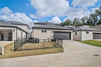Welcome to this elegant and spacious 4 bedroom, 3.5 bath garden on Shadow Valley Country Club in Arkansas - for sale on GolfHomes.com, golf home, golf lot