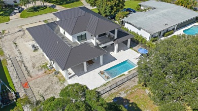 Welcome to your dream home in the heart of Tequesta! This brand on Turtle Creek Club in Florida - for sale on GolfHomes.com, golf home, golf lot