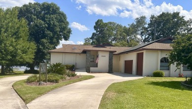 Welcome to 925 West Lake Damon Drive! This beautiful waterfront on River Greens Golf Course in Florida - for sale on GolfHomes.com, golf home, golf lot