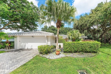 Photos feature remodel concept renderings.Set on a quiet on  in Florida - for sale on GolfHomes.com, golf home, golf lot