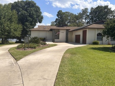 Welcome to 925 West Lake Damon Drive! This beautiful waterfront on River Greens Golf Course in Florida - for sale on GolfHomes.com, golf home, golf lot