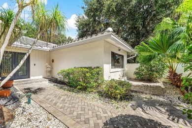 Photos feature remodel concept renderings.Set on a quiet on  in Florida - for sale on GolfHomes.com, golf home, golf lot