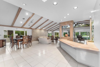 Photos feature remodel concept renderings.Set on a quiet on  in Florida - for sale on GolfHomes.com, golf home, golf lot