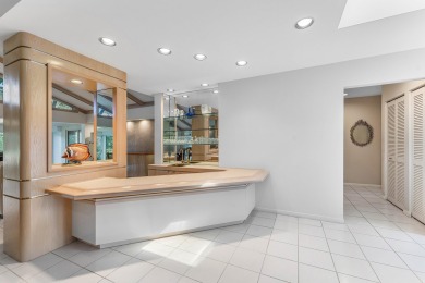 Photos feature remodel concept renderings.Set on a quiet on  in Florida - for sale on GolfHomes.com, golf home, golf lot