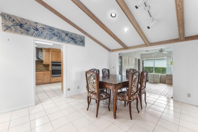 Photos feature remodel concept renderings.Set on a quiet on  in Florida - for sale on GolfHomes.com, golf home, golf lot