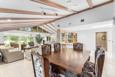 Photos feature remodel concept renderings.Set on a quiet on  in Florida - for sale on GolfHomes.com, golf home, golf lot