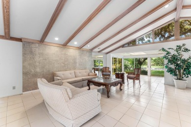 Photos feature remodel concept renderings.Set on a quiet on  in Florida - for sale on GolfHomes.com, golf home, golf lot
