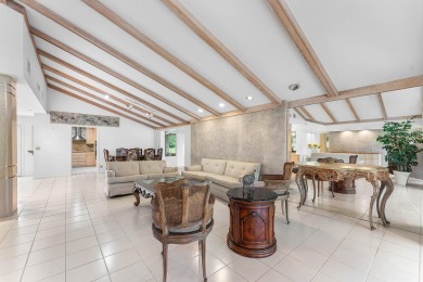 Photos feature remodel concept renderings.Set on a quiet on  in Florida - for sale on GolfHomes.com, golf home, golf lot