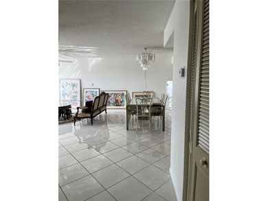 Welcome to Country Club Towers, a peaceful and sought-after on Coral Ridge Country Club in Florida - for sale on GolfHomes.com, golf home, golf lot