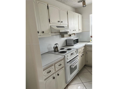 Welcome to Country Club Towers, a peaceful and sought-after on Coral Ridge Country Club in Florida - for sale on GolfHomes.com, golf home, golf lot